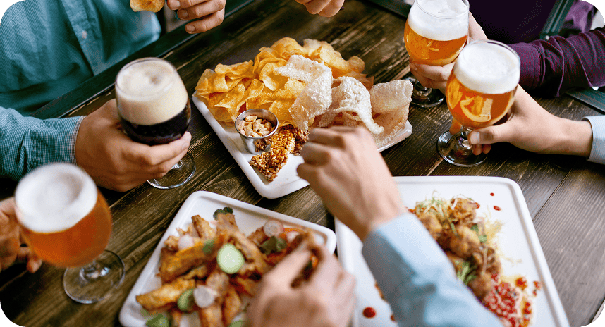 Customers dining at restaurant table