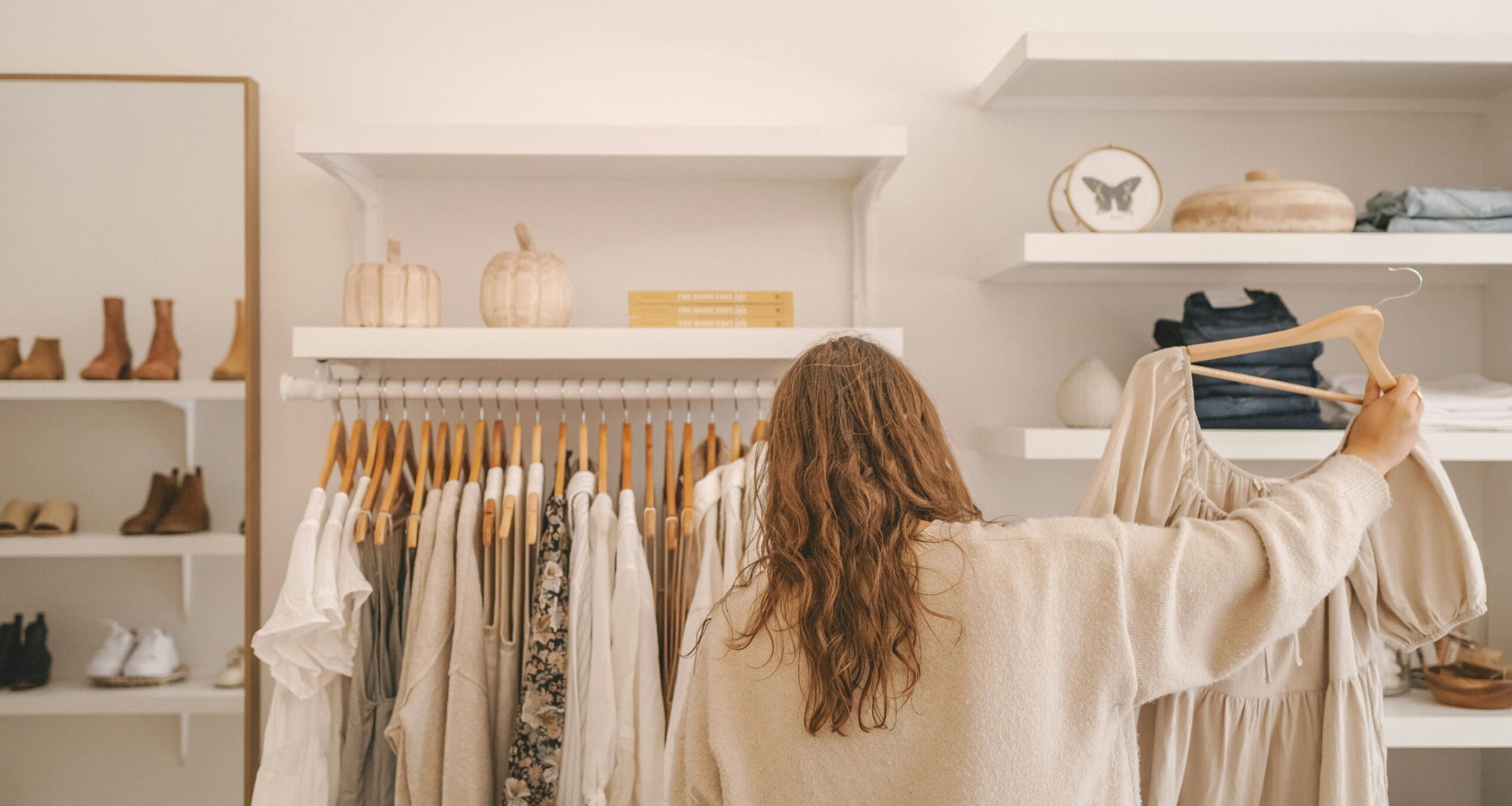 Customer browsing clothing in retail store