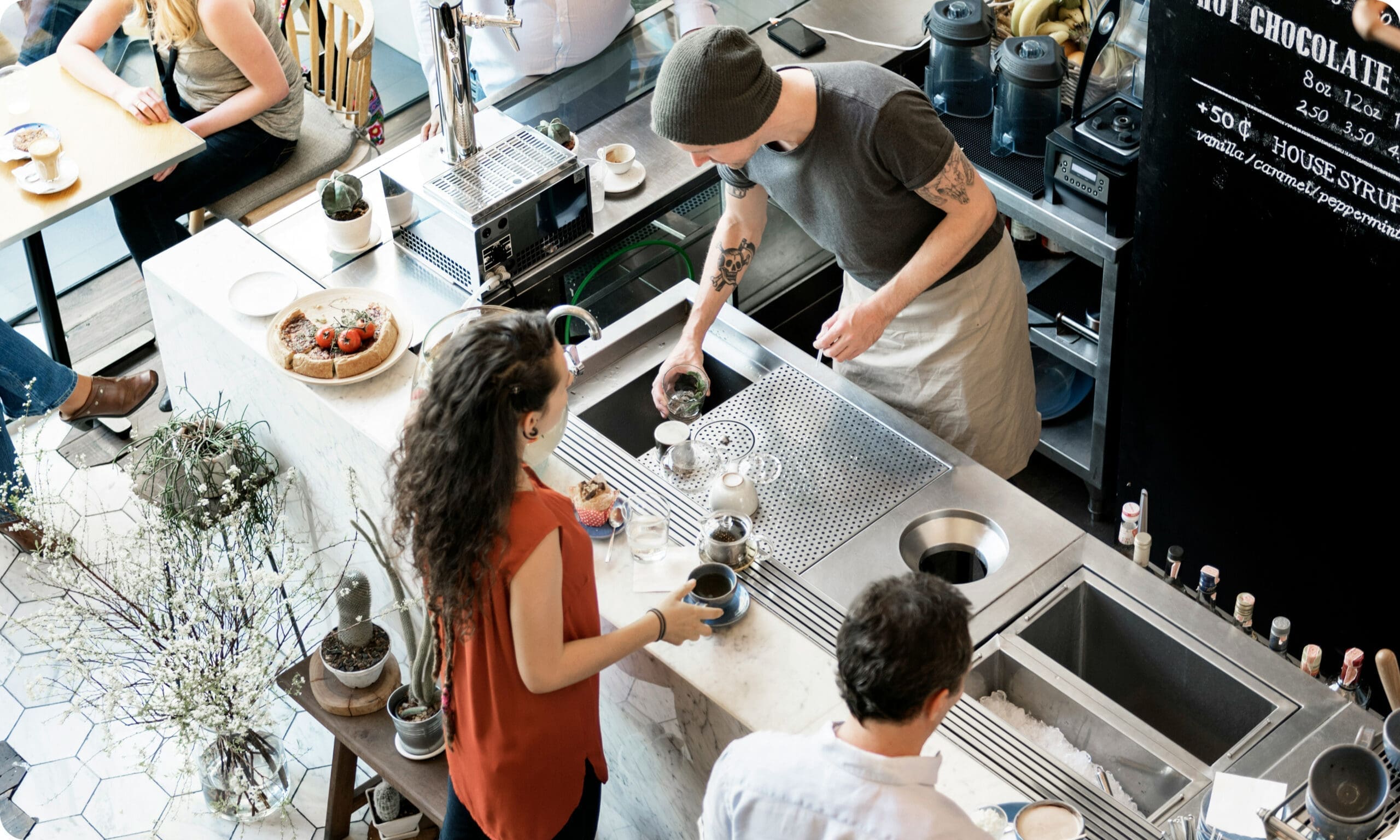 Customers at coffee shop counter