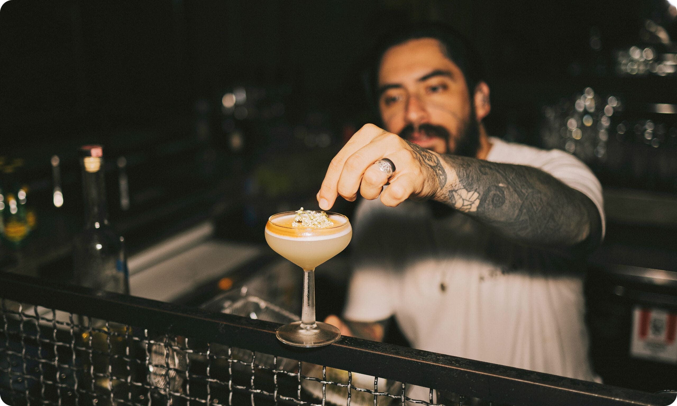 Bartender serving cocktail