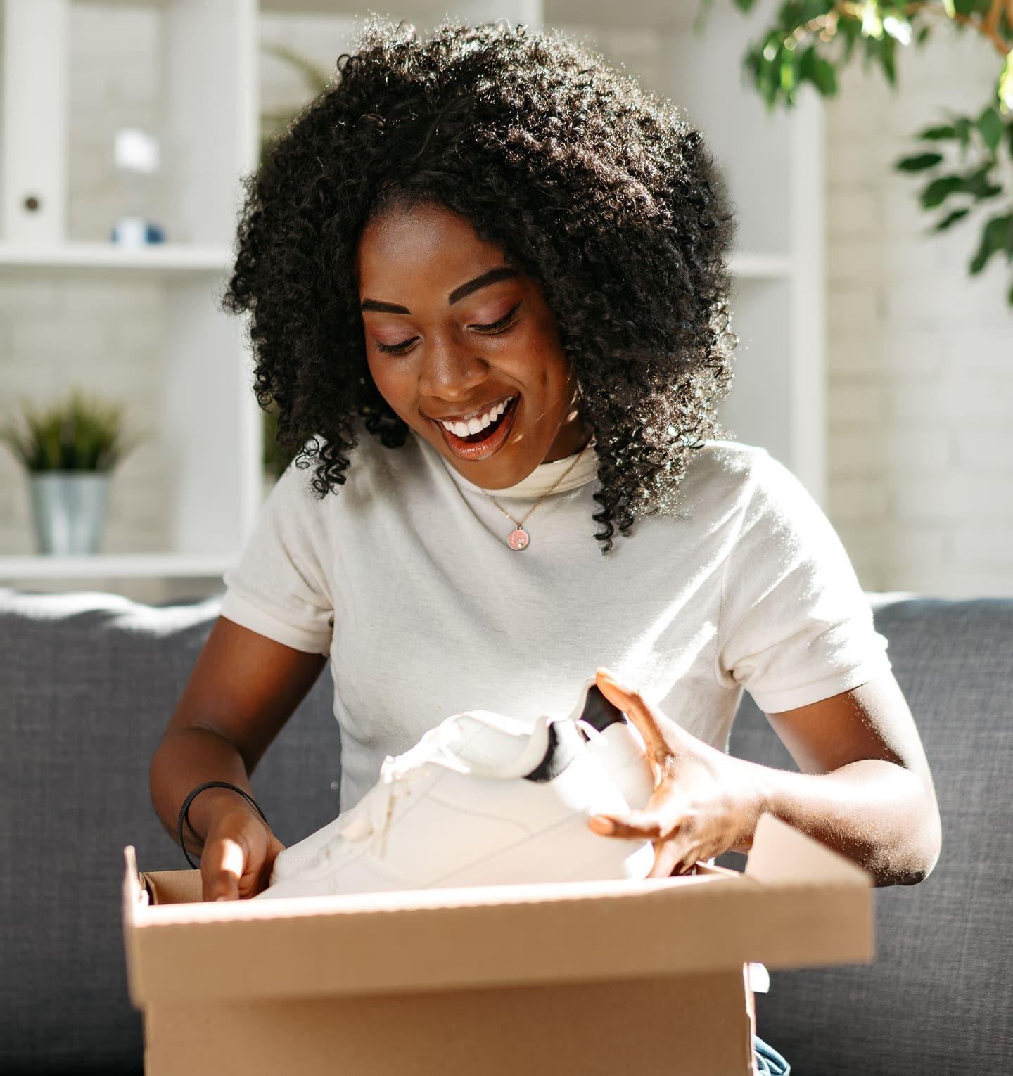 Customer opening delivered package