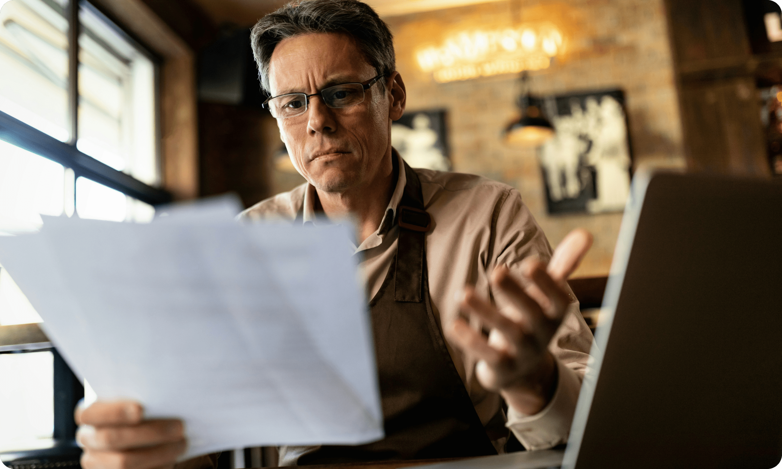 Business owner reviewing document